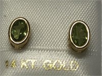 $300 14 kt gold peridot earrings