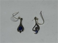 $100 Two pairs of silver earrings