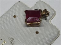 $250 10 kt gold Genuine enhanced ruby pendant
