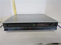 Vintage Sharp Auto Playback VCR; powers up