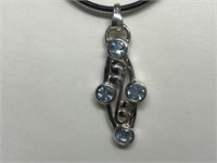 $160 St. Sil.  blue topaz pendant necklace
