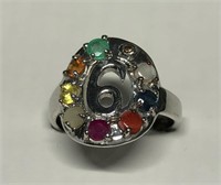 $120 St. Sil.  9 stone flexible size ring