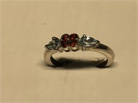 $120 St. Sil.  garnet and blue topaz ring