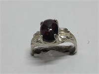 $100 St. Sil. Garnet Ring