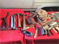 Box of hammers and drywall tools
