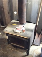 wood stove with stove pipe