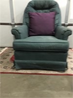 Upholstered Green Sofa Rocker