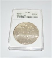 1991 D Korean War one dollar silver coin, graded