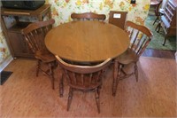 42" round maple dinette table with 2 10" leaves