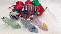 9 ball ornaments and 3 mini glass slipper