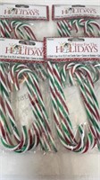 4 packs of 6 decorative red/green/white candy
