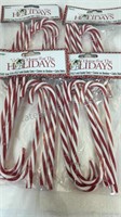 4 packs of 6 decorative red/white candy canes