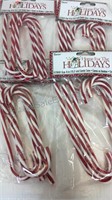 4 packs of 6 decorative red/white candy canes