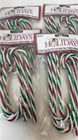 4 packs of 6 decorative red/green/white candy