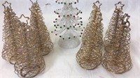 9 mini metal Christmas trees and white plastic