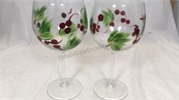 2 hand painted holly wine glasses