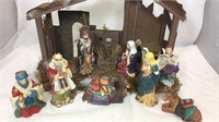 Manger and 8 Nativity figurines