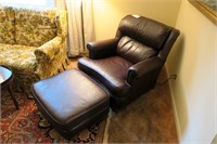 Brown vinyl armchair with ottoman
