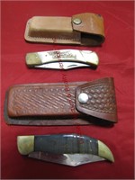 2 pocket knives w/ leather sheaths: 1 is FoxHound