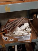 Box of Asian umbrella and clothes hangers