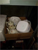 Box of cookware and tea kettles