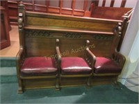 Ornate oak divided pew with 1/2 wall