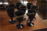Eight Ebony Pressed Glass Goblets