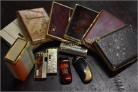 Assortment of Cigarette Cases and Lighters