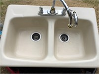 Cast-iron sink with new faucet