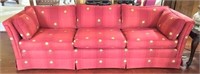 Red Sofa with Yellow Flower Design