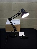 Swing arm desk lamp with weighted base and clamp