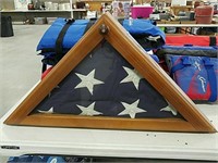 Triangle folded flag in display case
