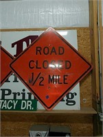 Orange Road Closed 1/2 mile construction sign