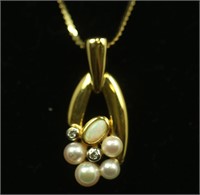 "14KT" GOLD OPAL PEARL AND DIAMOND PENDANT