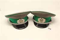 Two East German Border Guard Officer Hats.