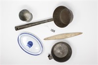 Tin water cup and ladle.
