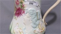 Hidden Image floral cider pitcher decorated
