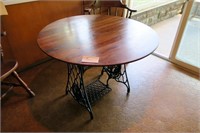 40" Round cherry topped table with iron Singer