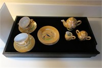 Child's Japanese porcelain tea set, service for 4