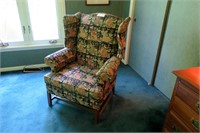 Upholstered wing back fireside chair