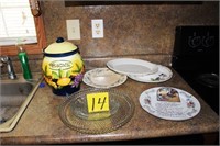 six (6) plates and biscotti jar