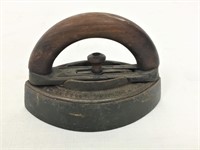 Antique iron with wood handle