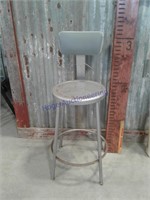 Tall metal stool with back
