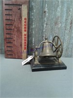 Brass bell on base