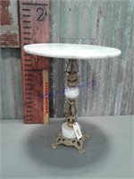 Small marble table, 17.5" tall, top is 15" across,