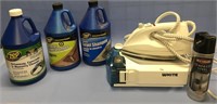 Lot with a steam iron, shampoo carpet cleaning mat