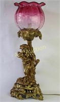 Figural Bronze Lamp with Cranberry Shade