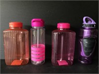 Lot of colorful Drinking Containers