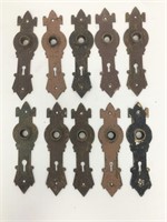 Ten matching antique door lock plates