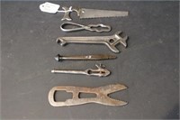 Group of small early tools including kids saw